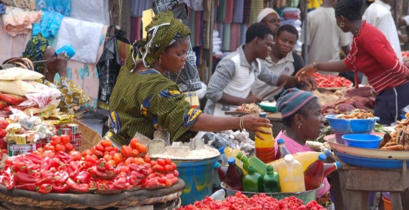 Women selling produce at a local market